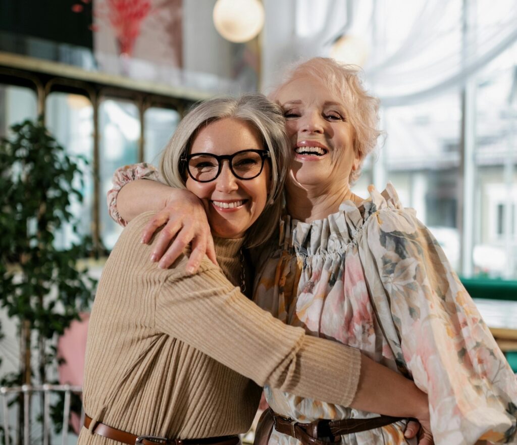 Two women hugging